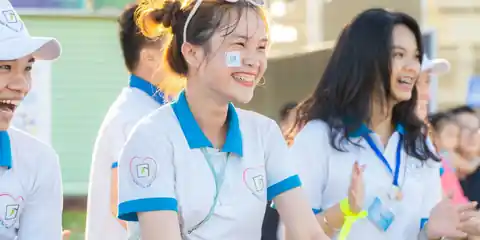 Volunteers in matching shirts at an outdoor festival