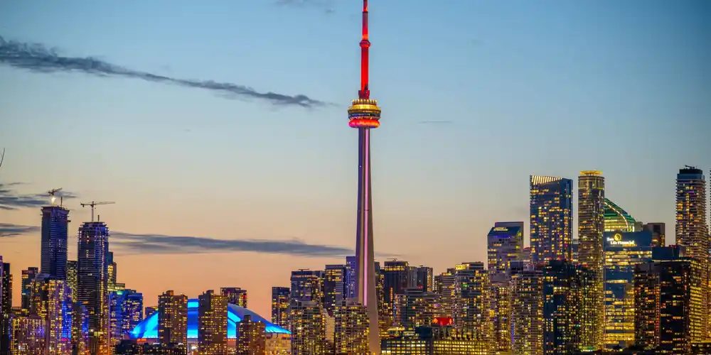 Toronto skyline and CN Tower at sunset