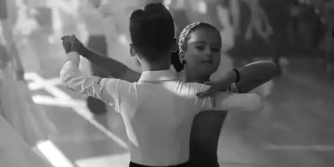 Young couples competing at a ballroom dance competition